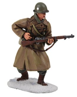 U.S. 101st Airborne Infantry Wearing Overcoat Reaching for Ammo, Winter 1944-45