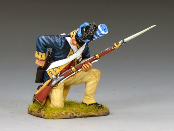 W.G.C. Kneeling Reaching For A Cartridge