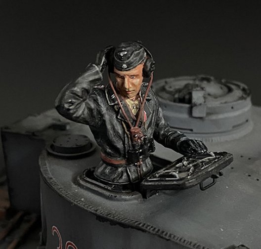 Waffen SS Tank Commander Holding Earphone