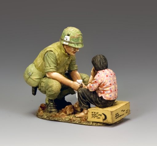 Hearts & Minds #1 - Marine helping Wounded Child
