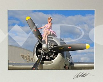 Tanya sitting on Curtiss C-46 "Tinker Belle" Propeller, 2017