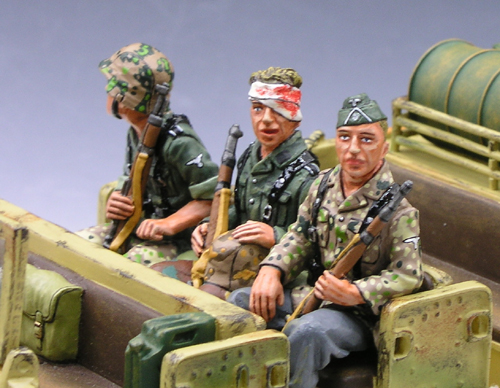 Three Seated Riflemen
