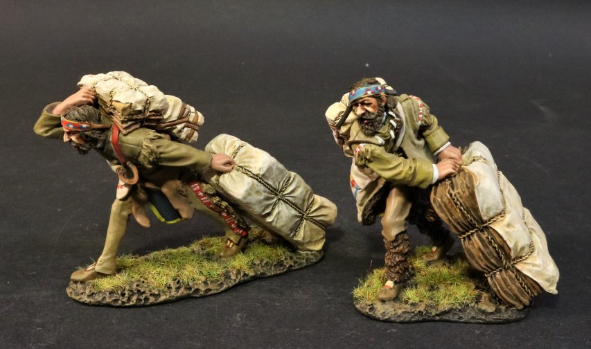 Two Mountain Men Moving Fur Bales