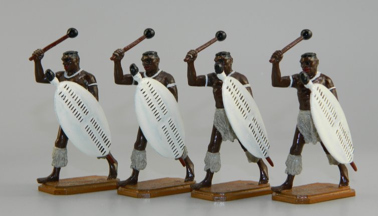 Four Running Zulu Warriors with Shields & Clubs